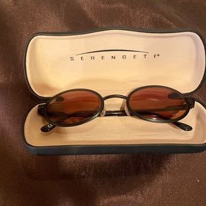 Serengeti Sunglasses- Ladies round lenses. Brown tinted.